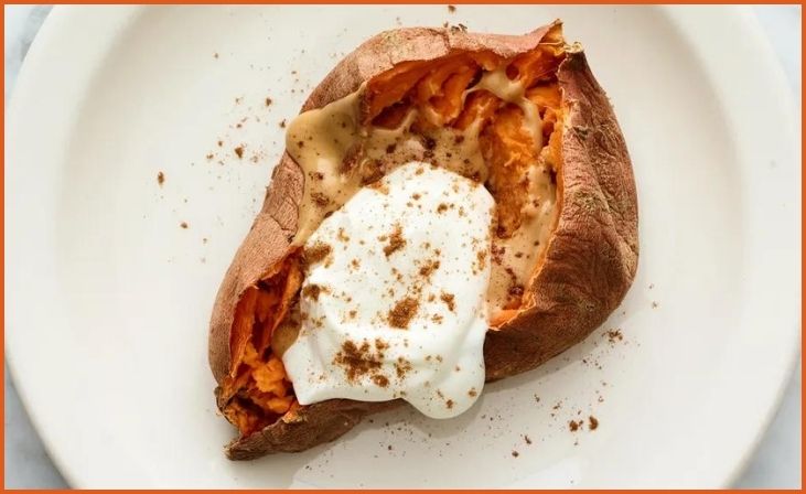 Baked Sweet Potato with Peanut Butter and Sliced Apples or Raisins